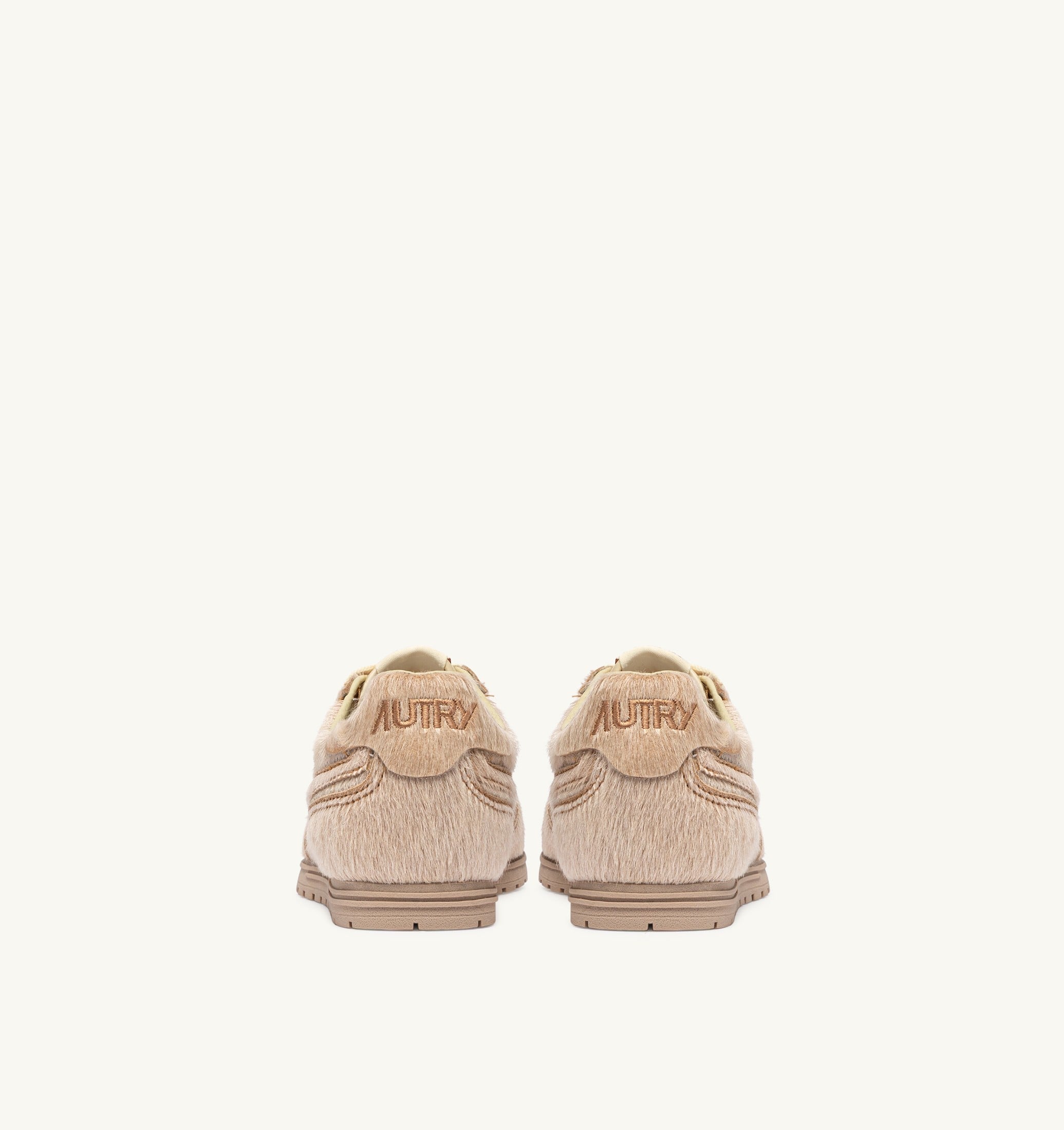 WINDSPIN SNEAKERS IN IVORY PONY SKIN EFFECT MATERIALL