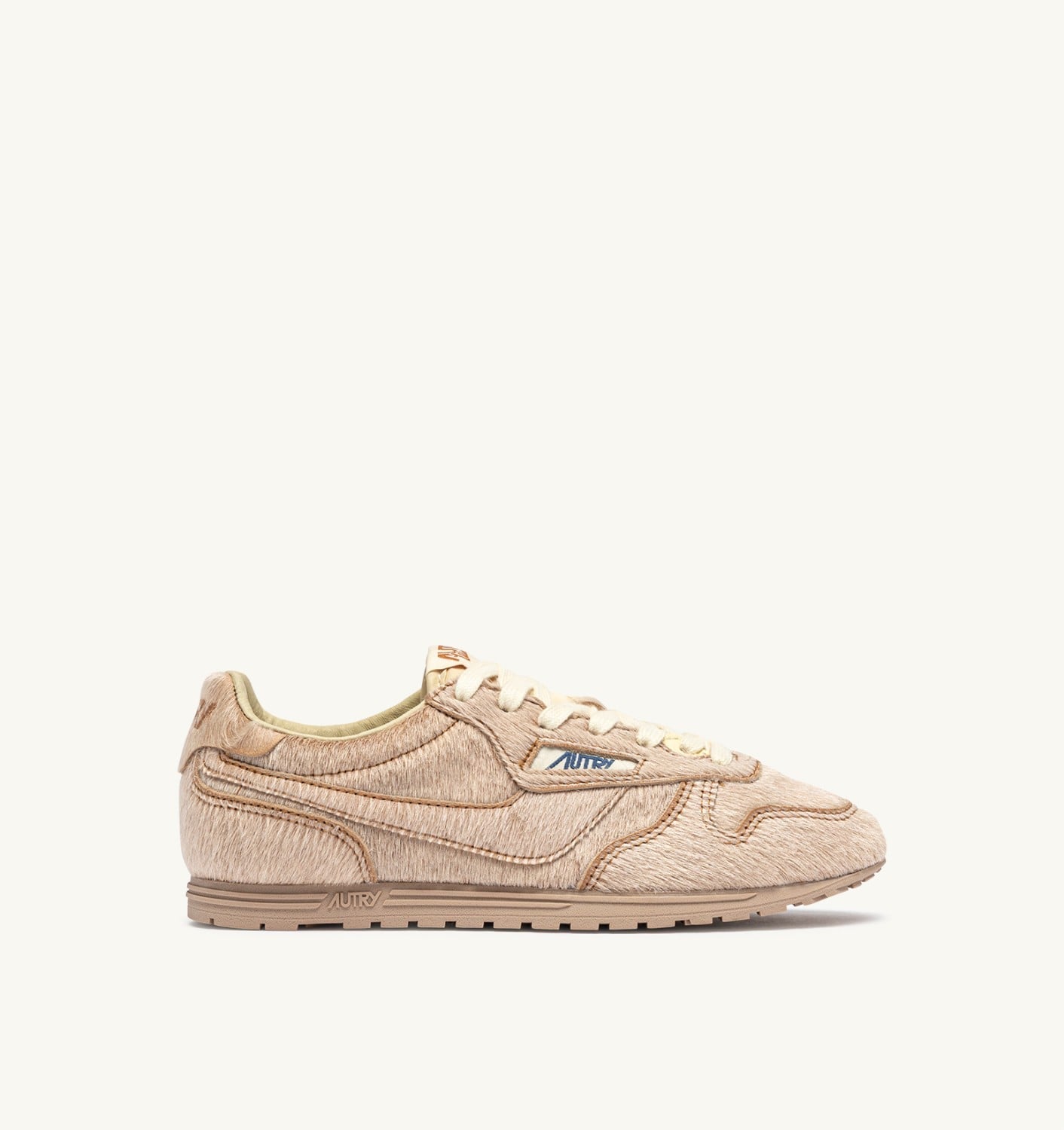 WINDSPIN SNEAKERS IN IVORY PONY SKIN EFFECT MATERIALL
