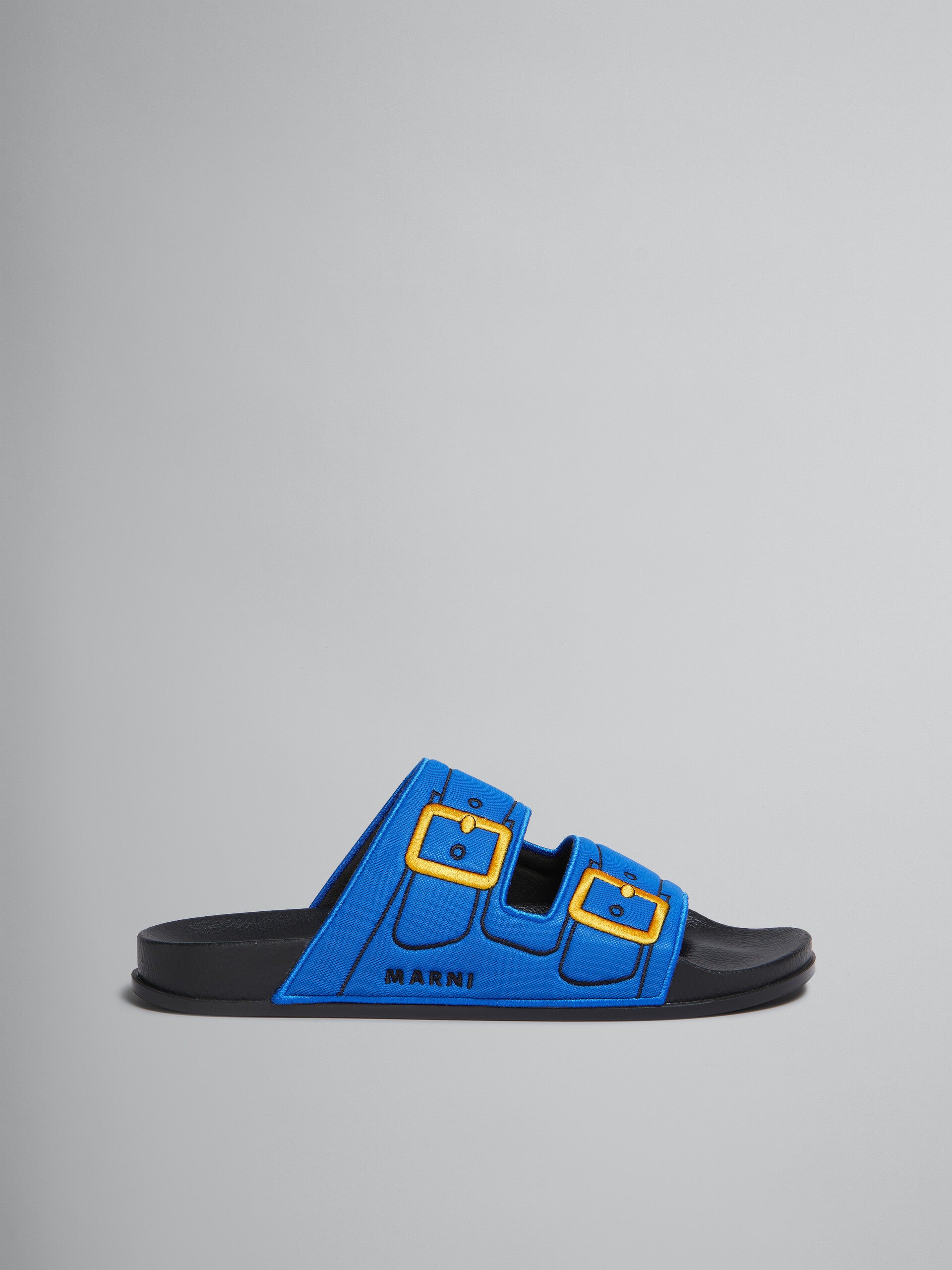 Blue Trompe L'Oeil Slider With Embroidered Buckles