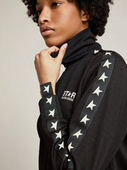 Women’s black zipped sweatshirt with white stars