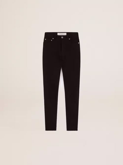 Woman’s black skinny jeans