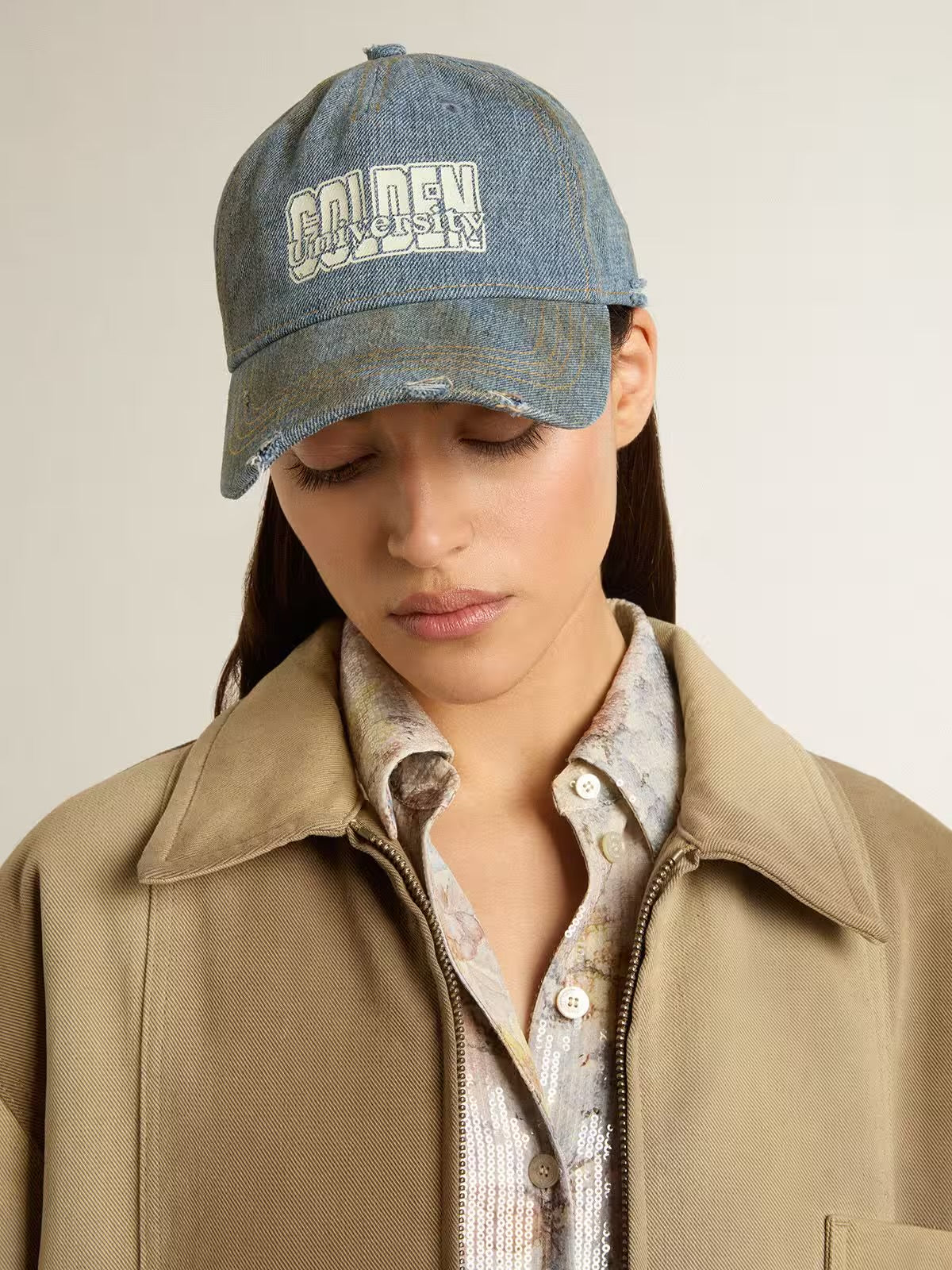 Denim-colored cotton baseball cap with a lived-in finish