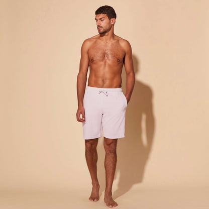 Man white linen Bermuda shorts