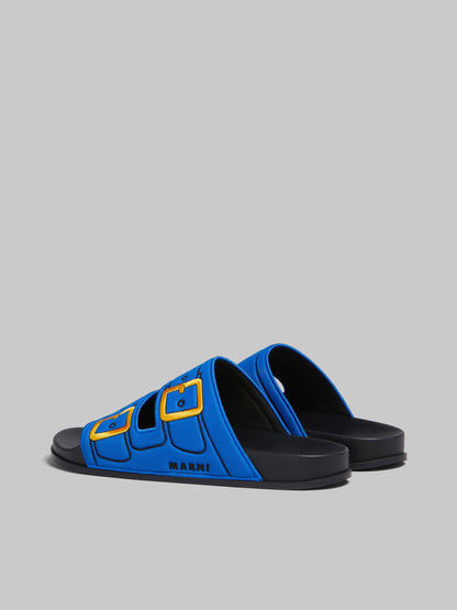 BLUE TROMPE L'OEIL SLIDER WITH EMBROIDERED BUCKLES