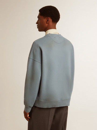 Oversized sweatshirt in baby blue with distressed finish