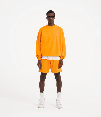 Neon orange logo print mesh bermuda shorts