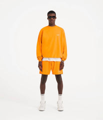 Neon orange logo print mesh bermuda shorts