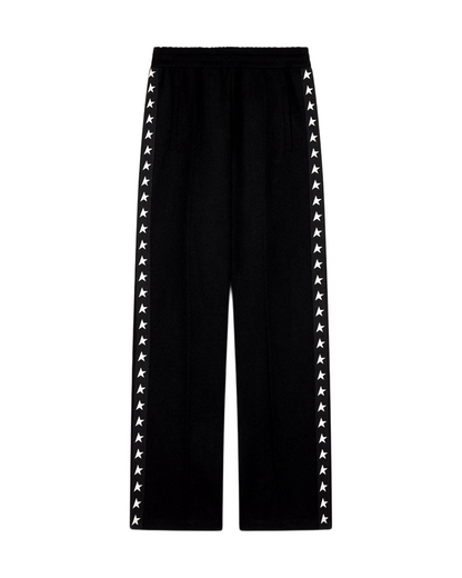 Women’s black joggers with white stars on the sides