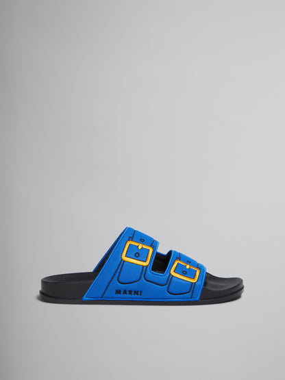 BLUE TROMPE L'OEIL SLIDER WITH EMBROIDERED BUCKLES