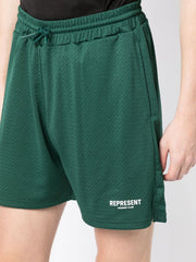 Green logo print mesh bermuda shorts