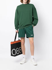Green logo print mesh bermuda shorts