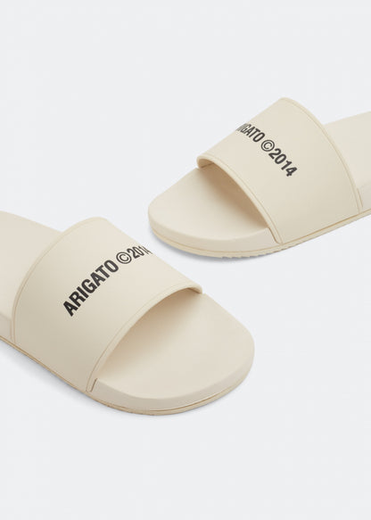 Beige logo pool sliders