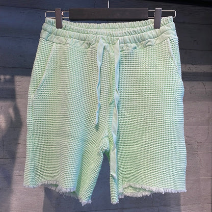 Ligirs light green shorts